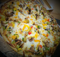 پیتزای سبزیجات من واقعاعالی شده بودهمه چی توش کرده بودم امتحانش کنین دوستان