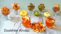 میوه ی خشک و دم نوشی از پرتقال و سیب خشک شده