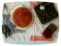 قرمه سبزی با ته دیگ سیب زمینی رنده شده