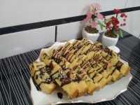 ^کـیـک هـمـراه بـا شـکـلـاتــ آبــ شــده^