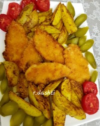 شنیتسل مرغ با سیب زمینی تنوری