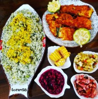 سبزی پلو باماهی با دمی برنج محلی