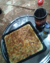 اولین پیتزای من که فوق العاده، عالی شده بود.