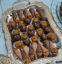 حلوا ارد نخودچی .توپک خرمایی