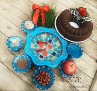 کیک و هفت سین در یک نما