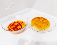 خورشت قیمه با ته دیگ سیب زمینی رنده شده..