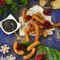 چوروس با سس شکلاتی (شیرینی اسپانیایی)