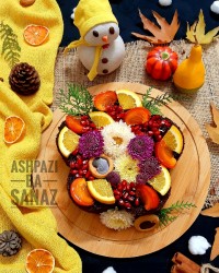 کیک شکلاتی با تزیین میوه های پاییزی (ایده یلدایی)