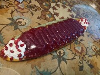 ژله اکلیلی انار با تزیین انار و خامه