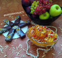 کمپوت سیب و گلابی باتزئین شکلات وخلال پسته وبادوم وزرشک