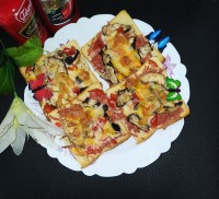 پیتزا با نون تست⁦❤️⁩⁦❤️⁩⁦❤️⁩