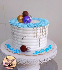 کیک مردونه فیلینگ مخصوص با تزئین گوی شکلاتی